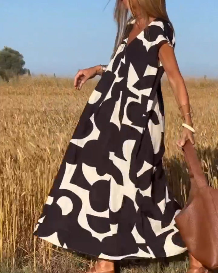 Victoria™ Elegant V-Neck Printed Dress
